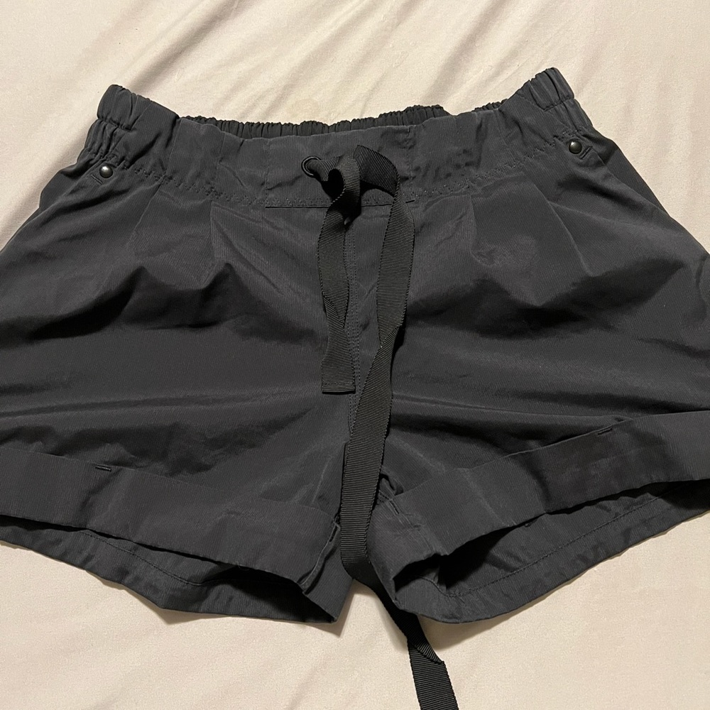 Women’s black drawstring waist Lululemon athletic shorts